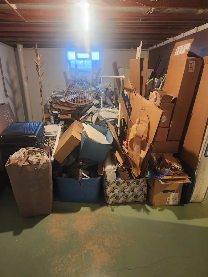 Roll-off dumpster container at job site for 4 Yard Dumpster Rental in Progress Village